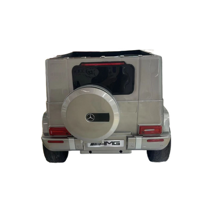 Kids_electrice_ride_on_g-Class_5XL_mercedes_self_driven_or_remote_controlled_Kids_battery_operated_car-white_iglide_AMG_kids_battery_operated_sit_in_car_children_interior_doors_open_and_close_from_front_metallic_silver